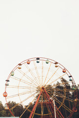 Urban geometry, modern architecture, Abstract and Inspirational architectural design. Ferris wheel in an amusement Park.