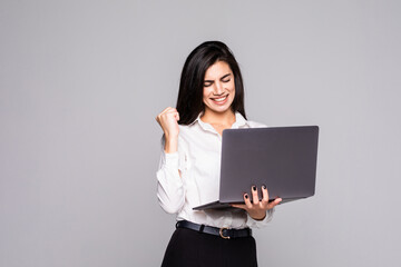 Portrait of a modern businesswoman happy of her success isolated over white background