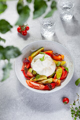 Burrata cheese with Basil leaves and tomatos. Caprese salad