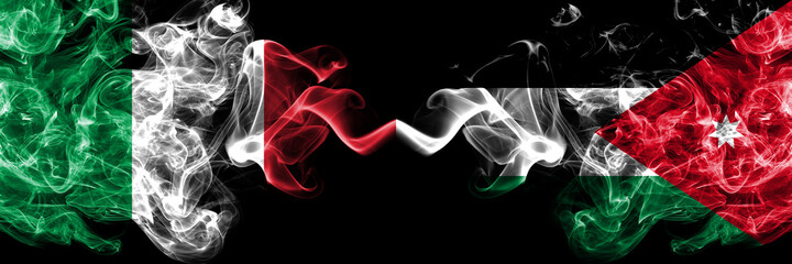 Italy vs Jordan, Jordanian smoky mystic flags placed side by side. Thick colored silky abstract smoke flags of Italian and Jordan, Jordanian