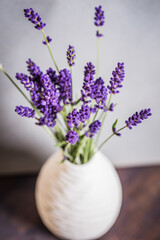 Fresh flowers of lavender bouquet on rustic wooden background