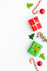 Christmas pattern of gift boxes and christmas decorations, from above