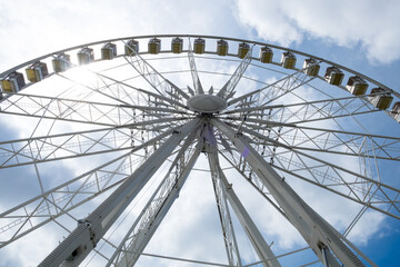 Fototapeta premium A giant panoramic Ferris wheel with a great cityscape in the center of Budapest, Hungary