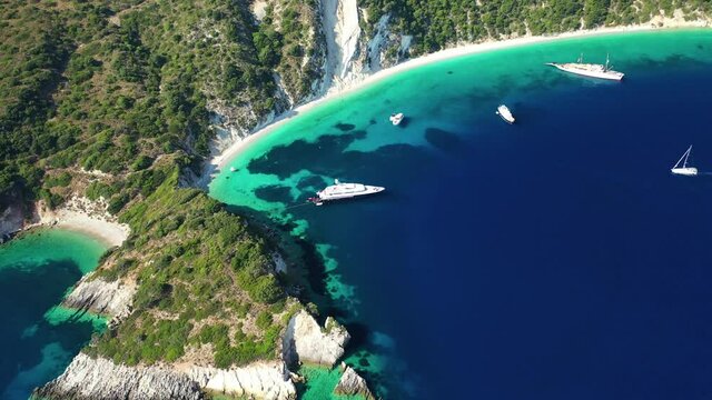 Aerial drone video of beautiful paradise turquoise sea sandy beach and bay of Gidaki accessible by short hiking in beautiful Ionian island of Ithaki or Ithaca, Greece