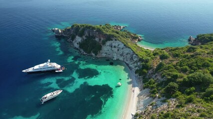 Aerial drone video of beautiful paradise turquoise sea sandy beach and bay of Gidaki accessible by short hiking in beautiful Ionian island of Ithaki or Ithaca, Greece