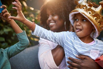 Little girl reach hand to take cell phone