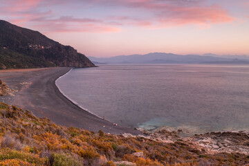 Sunset on the north western coast of the Mediterranean island of Corsica, France.