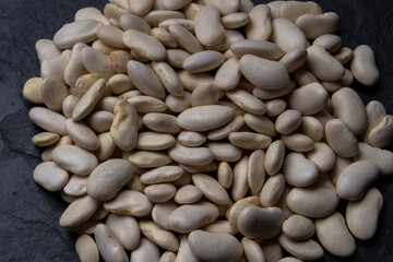 Natural white bean closeup background.