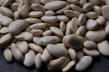 Natural white bean closeup background.