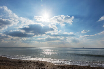 Beautiful view of the sea from a bird's eye view. The stunning cloudy sky reflected on the beach Fontanka, Odessa, Ukraina. Concept of leisure and sea travel.