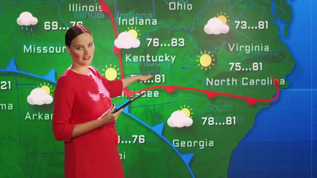 Live Weather News Studio with Professional Female On-Camera Meteorologist Standing Beside Screen and Making Gestures to Point at Weather Synoptic Map Chart for United States of America