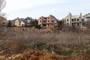 landslide caused by torrential rains of hurricane CHRISTIE. Broken road asphalt cracked, and came down with landslide. Destroyed residential buildings of cottage town elite settlement. earthquake