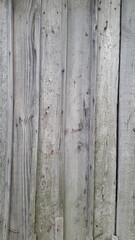 Obraz premium Old gray boards. A panel made of old weathered sedges. Wooden vintage background
