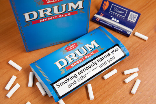 drum tobacco bright blue Drum Bright Blue rolling tobacco Stock Photo