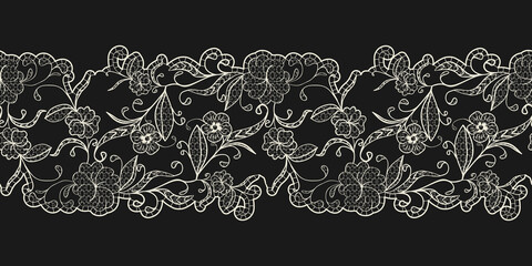 White lace on a black background. Horizontal seamless pattern. Openwork ribbon border. - obrazy, fototapety, plakaty