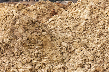 Red soil earth texture background realistic closeup background. Texture of land dried up by drought