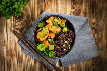 Thai red curry with chicken and black rice.