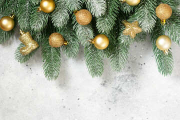 Christmas banner with a Christmas tree and gold decorations on a light background. Christmas or new year flatly. Copyspace