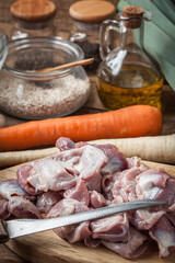 Preparing to cook raw chicken stomach.