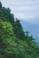 Mountain landscape covered in clouds and fog on Wugong Mountain in Jiangxi, China