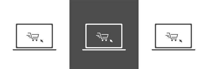 Shopping cart on a laptop keyboard. Concept about online shopping