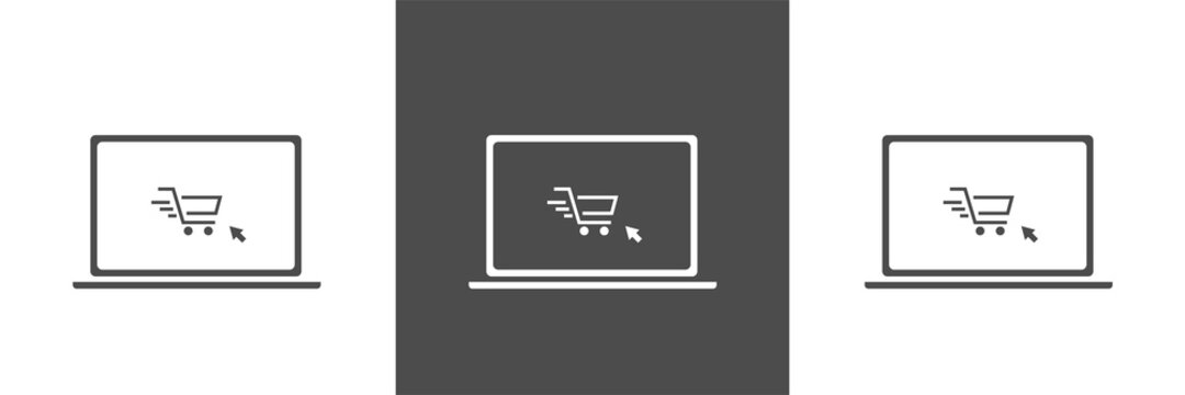 Shopping cart on a laptop keyboard. Concept about online shopping