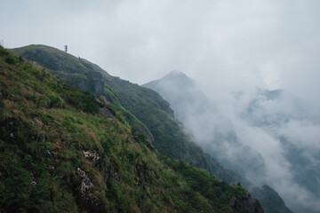 Mountain landscape covered in clouds and fog on Wugong Mountain in Jiangxi, China