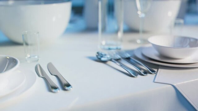 Elegant tableware at the restaurant. Dinner set at the reception. Seamless loop.