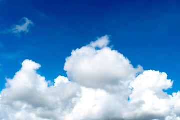 Naklejka na ściany i meble Nature background of white cloud on blue sky.