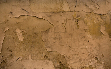 Grunge plastered wall with cracks. Old dirty wall. Abstract retro background or texture.