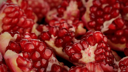 ripe fresh pomegranate close up. broken pomegranate 