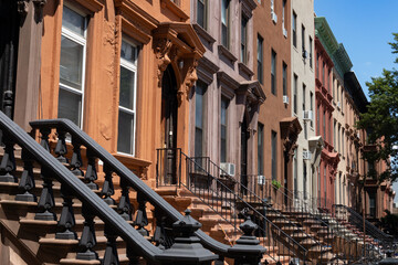 Row of Old Brownstone Homes in Bedford-Stuyvesant in Brooklyn of New York City with Staircases