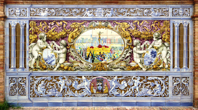 Image of easter procession in the the holy week of Sevilla painted on ceramic tiles representing the Spanish traditions - seating benches in Spain Square in Seville