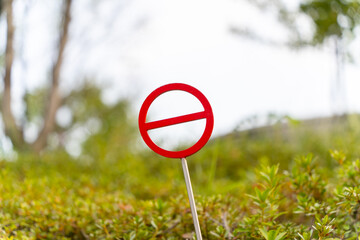 Red no-entry sign installed to protect the garden