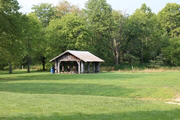 The old wood picnic shelter in the park.