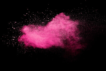 Pink powder explosion on black background. Colored cloud. Colorful dust explode. Paint Holi.