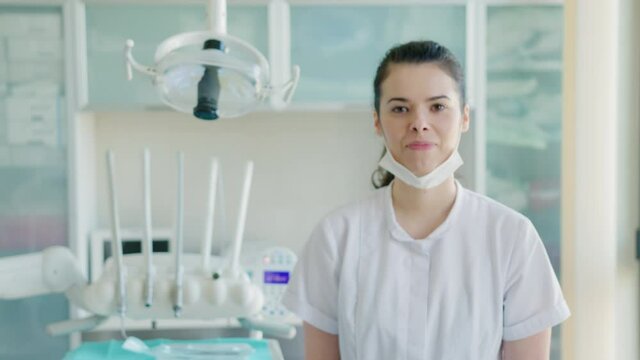 Female dentist in dentists office