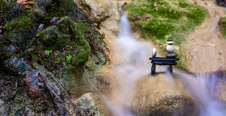 Balanced Zen stones at the waterfalls