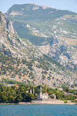 Fototapeta premium View to the Perast Old Town, Saint Nicholas church and coast of Bay of Kotor, Montenegro