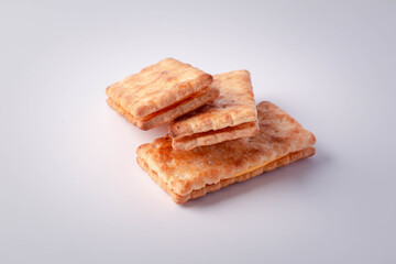 Three biscuits on a white background