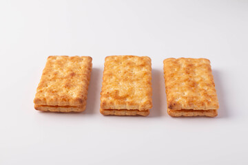 Three biscuits on a white background