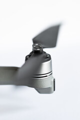 Drone propeller in shallow depth of field on white background