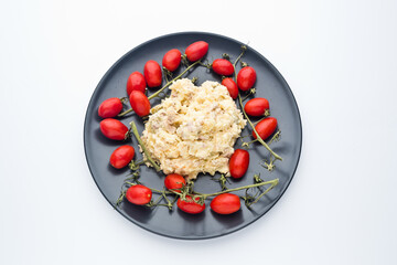 Russian salad. With red tomatoes, with white background.Spain