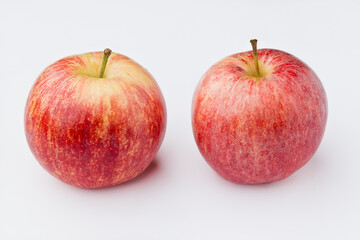 Red apple, with white background. Asturias, Spain