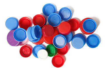Heap of plastic bottle caps ready for recycling