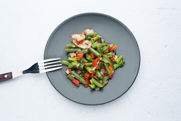 Sauteed vegetables, on white background. In study