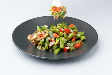 Sauteed vegetables, on white background. In study