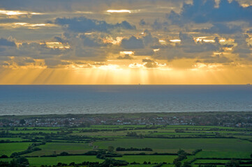 Sunset view from Brent Knoll towards the Bristol Channel, Somerset