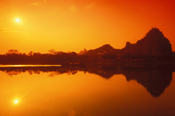 Reflection of the sun in water, China 