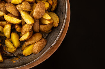 Golden potatoes in cast iron skillet